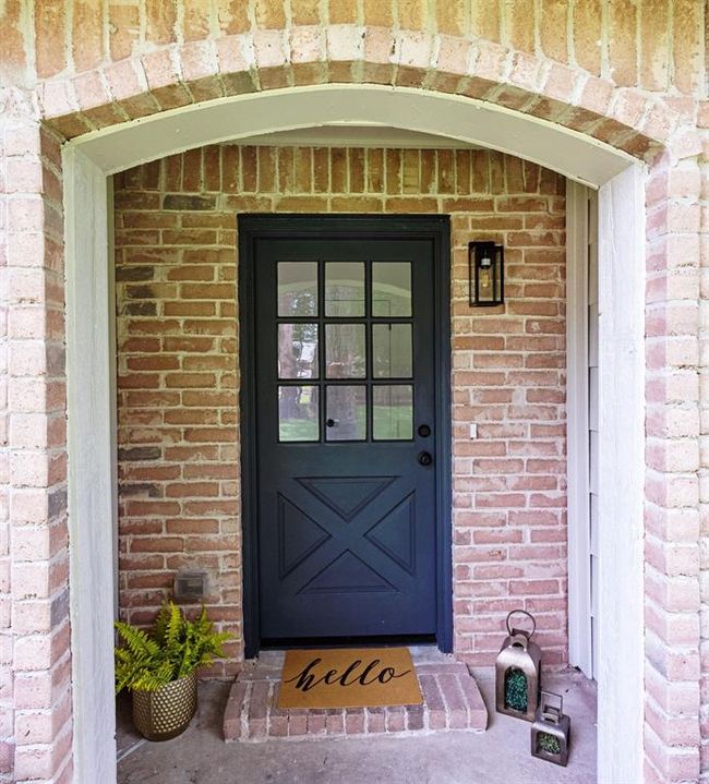 A charming front door that welcomes you home. | Image 8
