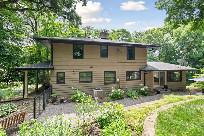 Wrap-around porch leads to the back yard (new fence in 2018) | Image 29