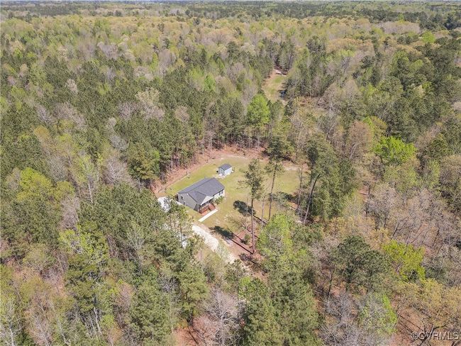 Birds eye view of property featuring a wooded view | Image 48