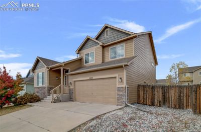 6841 Red Cardinal Loop, House other with 3 bedrooms, 2 bathrooms and 2 parking in Colorado Springs CO | Image 1