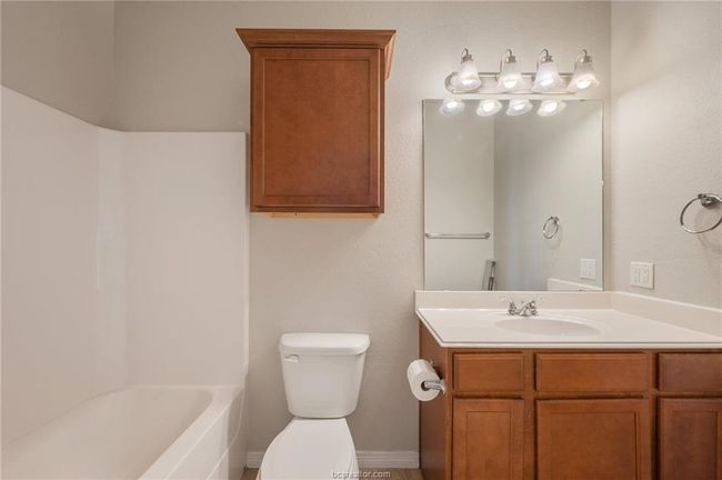 Full bath featuring toilet and vanity | Image 18