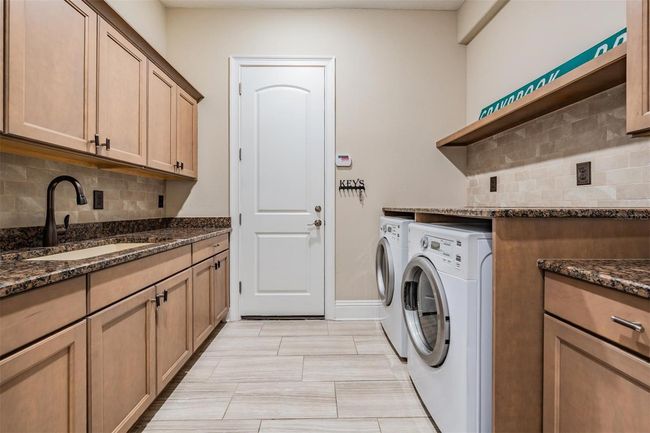 Spacious Laundry Room | Image 18