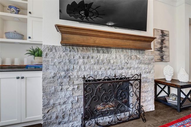 Stacked stone fireplace makes a grand statement piece! | Image 11