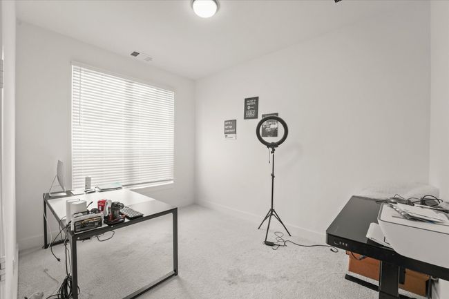Office featuring carpet and baseboards | Image 11