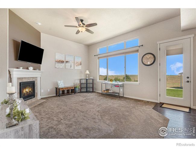 large windows with shades | Image 7