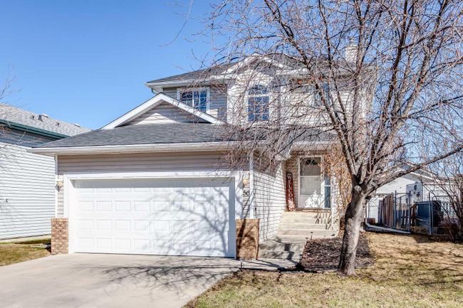 56 Silver Creek Boulevard Nw, Home with 4 bedrooms, 2 bathrooms and 4 parking in Airdrie AB | Image 2