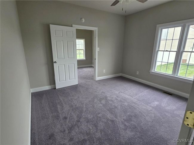 Unfurnished sunroom featuring ceiling fan | Image 23