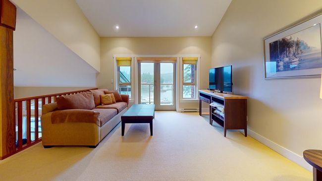 Loft area with baseboards, light colored carpet, recessed lighting, and french doors | Image 34