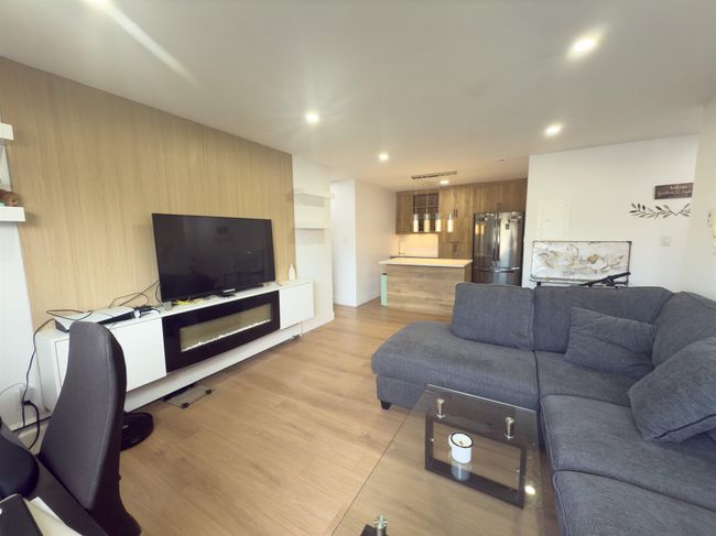 Living room with recessed lighting and light wood-type flooring | Image 7
