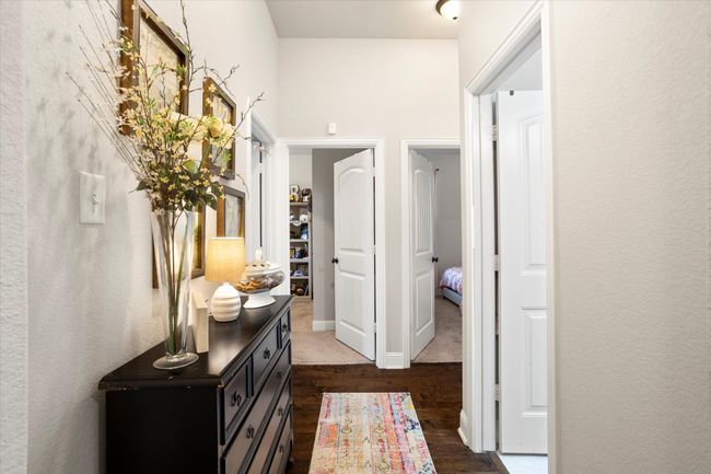 Hall with dark wood-style floors and baseboards | Image 6