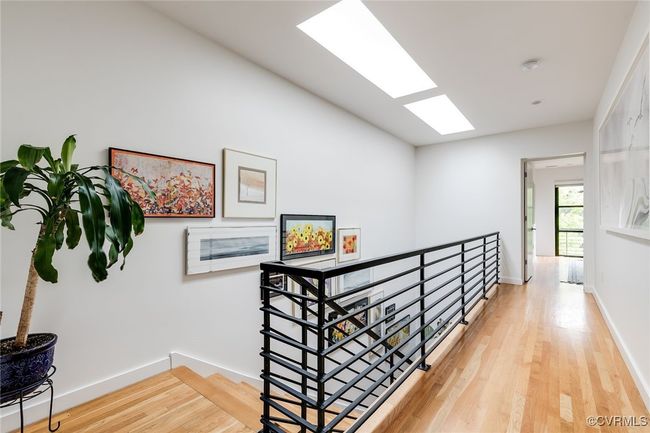 The skylight provides ample light throughout the property. | Image 28