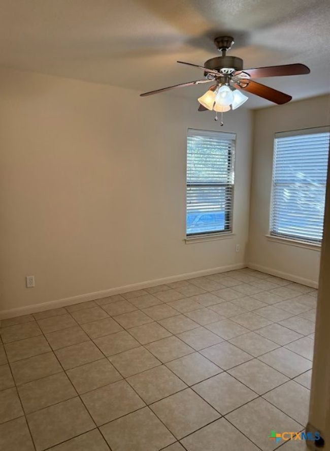 Bedroom view of with great space and natural light. | Image 25