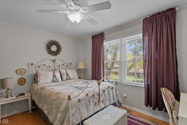 bedroom with ceiling fan | Image 23