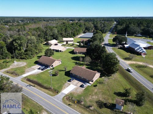 76 Wilkinson Rd Ne, Ludowici, GA, 31316-7329 | Card Image