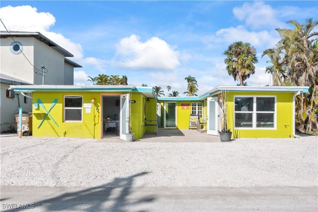 Rear view of property featuring a patio area | Image 13