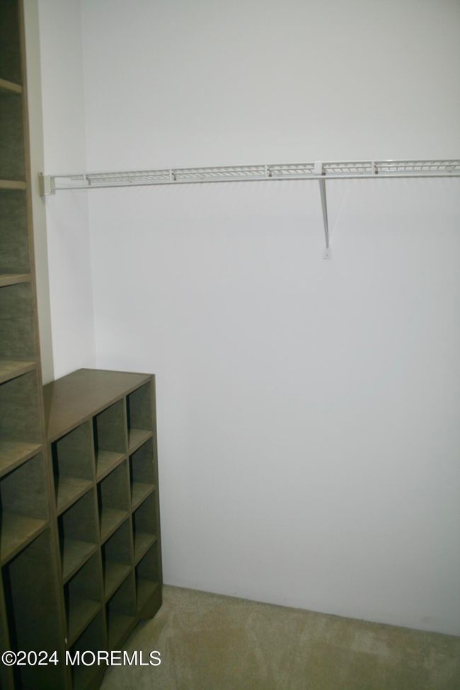 Walk-in closet in master bath area | Image 18