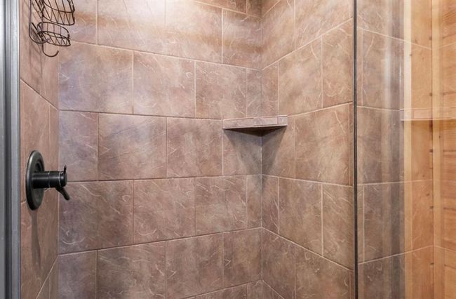 Bathroom view of tiled shower | Image 17