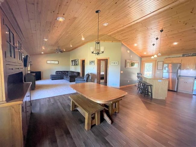 Very spacious open design with living, dining and kitchen area. | Image 5