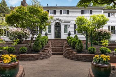 Colonial inspired home with a patio | Image 2