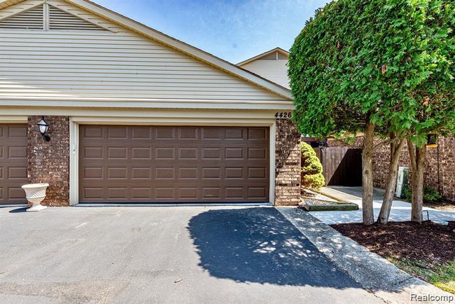 Garage with asphalt driveway | Image 35