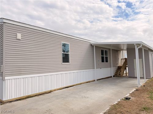 827 Peaceful Dr, NORTH FORT MYERS, FL, 33917-6384 | Card Image