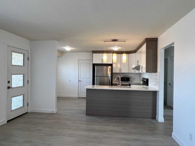 6132 Madigan Drive Ne, Home with 5 bedrooms, 2 bathrooms and 2 parking in Calgary AB | Image 4