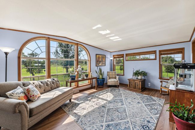 Open living room with window views | Image 12