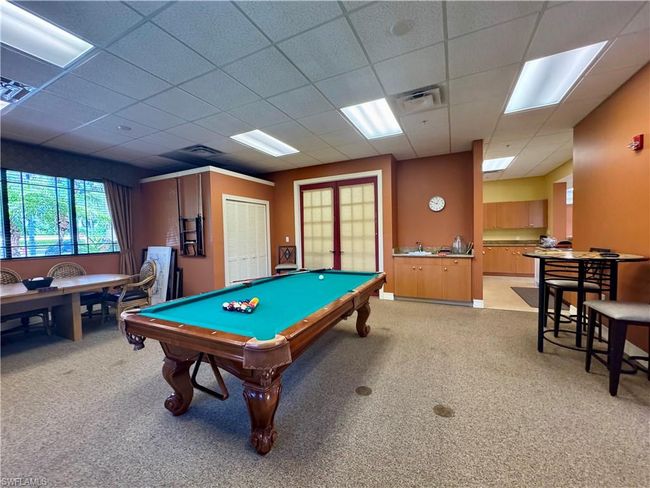 Playroom with visible vents, light colored carpet, and billiards | Image 34