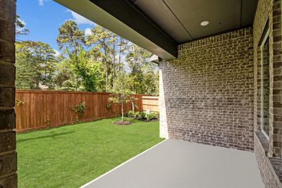 Private rear yard provides a beautiful, serene setting! | Image 2