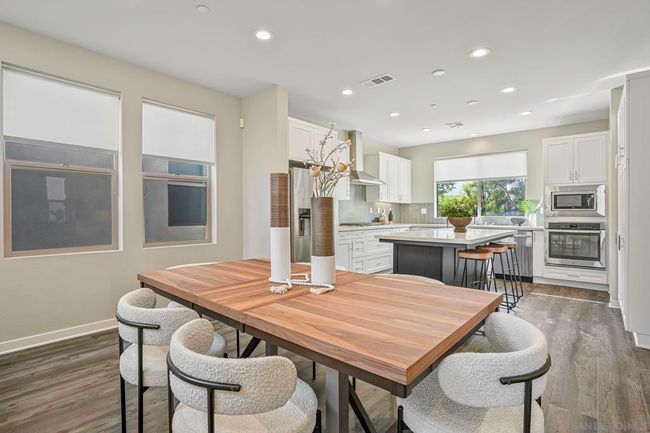 Great dining room with direct access to kitchen and family room | Image 12