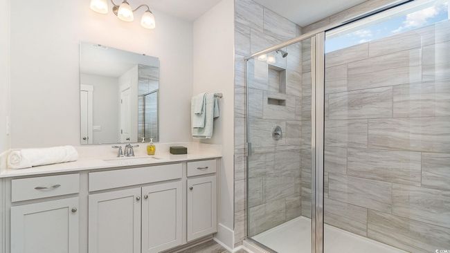Full bathroom featuring vanity and a stall shower | Image 20