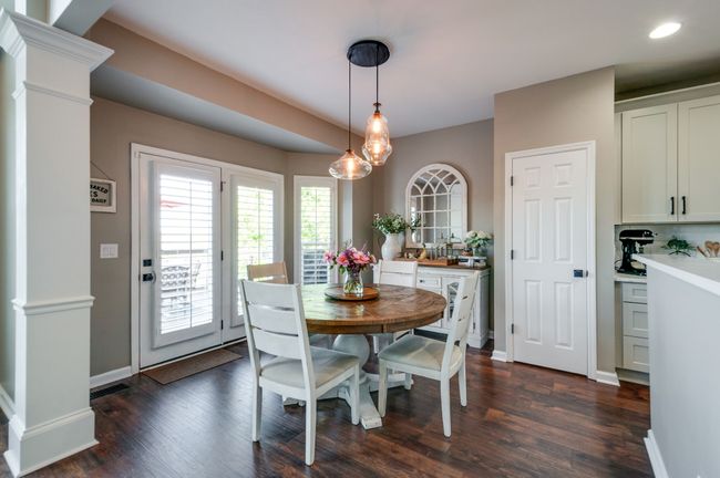 Inviting breakfast room overlooking the deck and the backyard. | Image 14