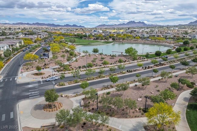Drone / aerial view featuring a residential view and a water and mountain view | Image 39
