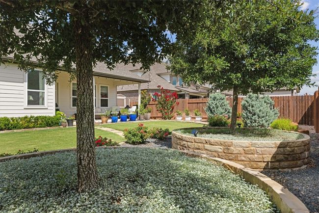 View of yard from under one of the large shade trees | Image 30