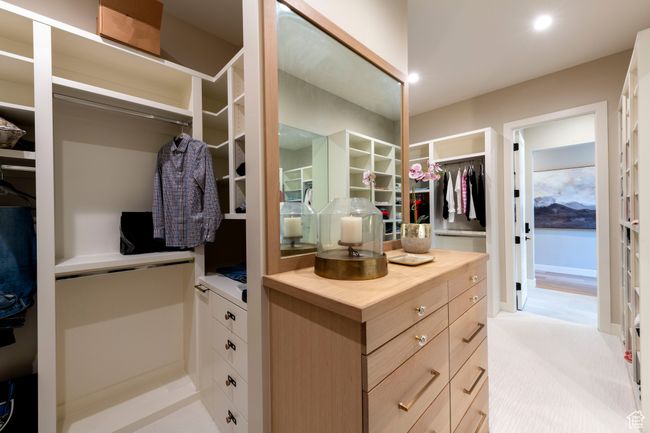 Walk in closet with light colored carpet | Image 33