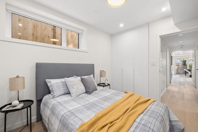 Bedroom with baseboards, recessed lighting, a closet, and light wood-style flooring | Image 16