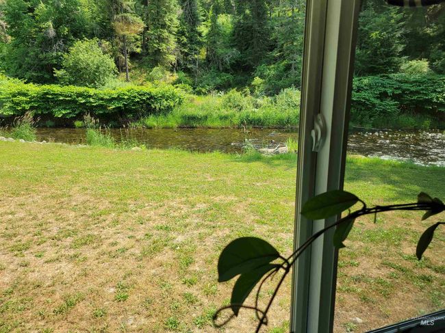 View of grassy yard with a water view | Image 26