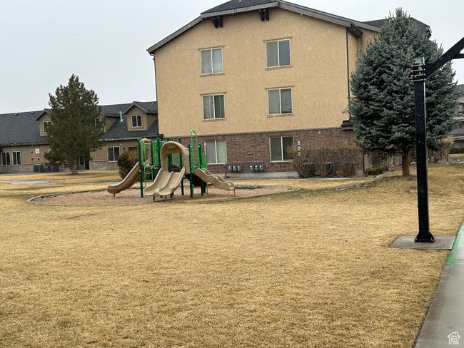 Community play area featuring a yard | Image 21