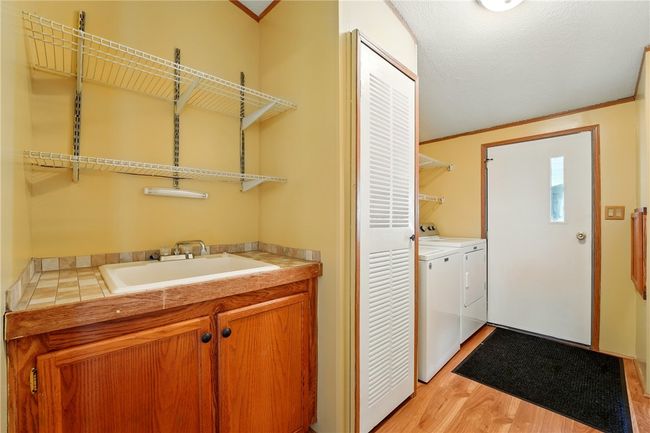 MAIN FLOOR LAUNDRY AREA. WASHER/DRYER INCLUDED. | Image 17