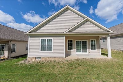 Rear view of property with covered porch | Image 2