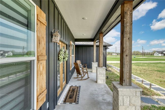 View of patio with covered porch | Image 7