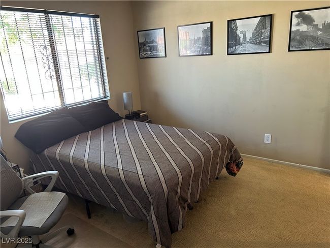 Bedroom featuring carpet flooring and baseboards | Image 31