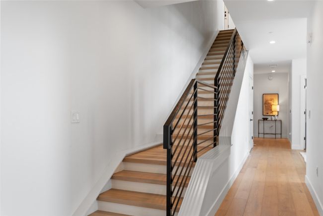 Stairs featuring hardwood / wood-style floors, recessed lighting, and baseboards | Image 15