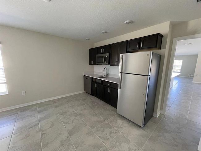 1832 Ancestry Trl, House other with 5 bedrooms, 3 bathrooms and null parking in KISSIMMEE FL | Image 8