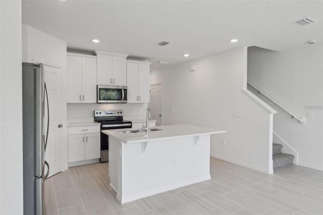 16403 Bird Of Paradise Ave, Townhouse with 3 bedrooms, 3 bathrooms and null parking in CLERMONT FL | Image 11