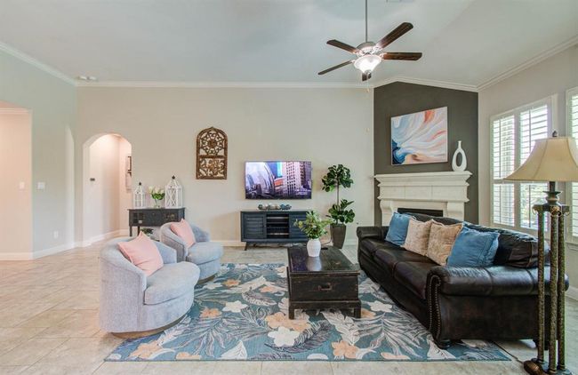 Host guests in this lovely living room. | Image 8