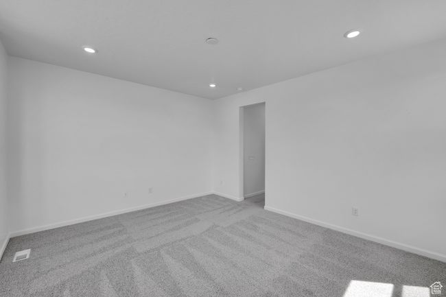 Empty room with carpet floors and recessed lighting | Image 24