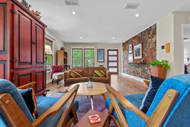 MAIN: View of front entry from living room | Image 4