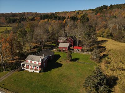 Outbuildings are 2-Car Garage, Barn & Wood Shed. | Image 3