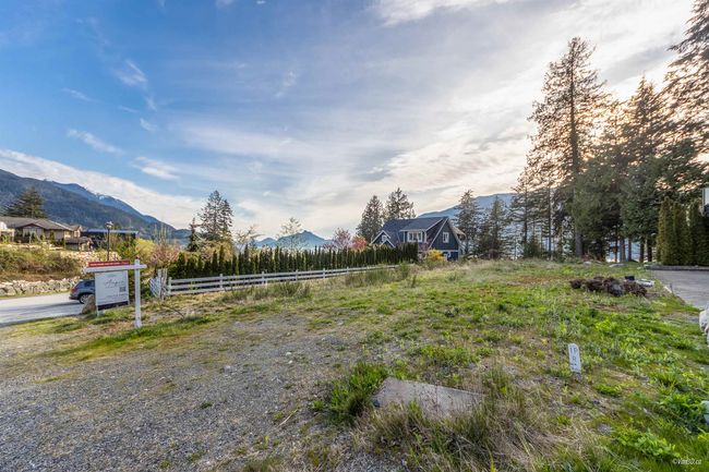 View of yard with fence and a mountain view | Image 8